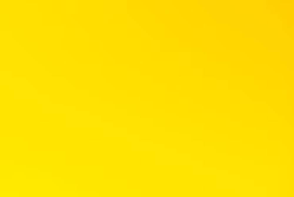 Vibrant yellow gradient background with a smooth texture, evoking a warm and cheerful atmosphere.